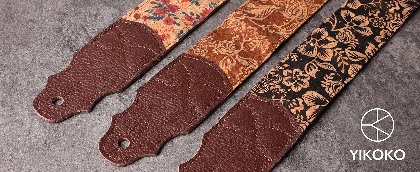 Гітарний ремінь з натуральної шкіри (2 дюйми) для акустичної, бас та електрогітари. Регулюється від 96 до 163 см. М'яка обробка деревини, коричнева квітка.