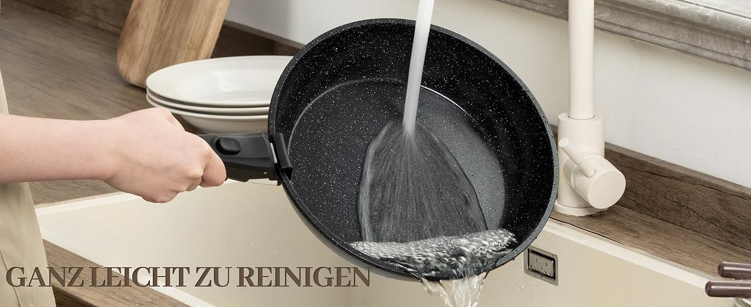 Набір посуду керамічний 23 предмети з антипригарним покриттям та знімними ручками, чорний. Підходить для всіх типів плит, включаючи індукційні. Сковороди 20/26 см, каструля 18 см, сотейник 24 см, жароміцний.