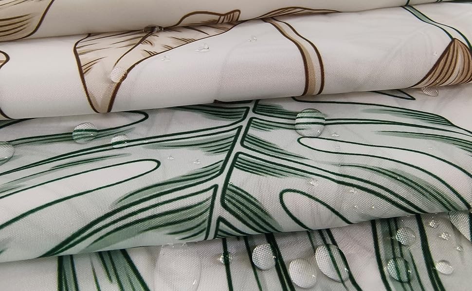 Штора для душу 180x200 см, текстильна, зелена. Матеріал: поліестер, антигрибкова, водонепроникна, з обтяженим краєм, з люверсами та 12 кільцями для душу. Підходить для ванни.