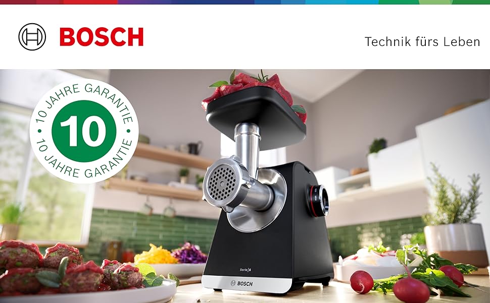 М'ясорубка Bosch MFW68660 срібляста (чорна) 2200 Вт, насадки для ковбас, 4 терки, 3 диски з нержавіючої сталі (3/4.8/8 мм)