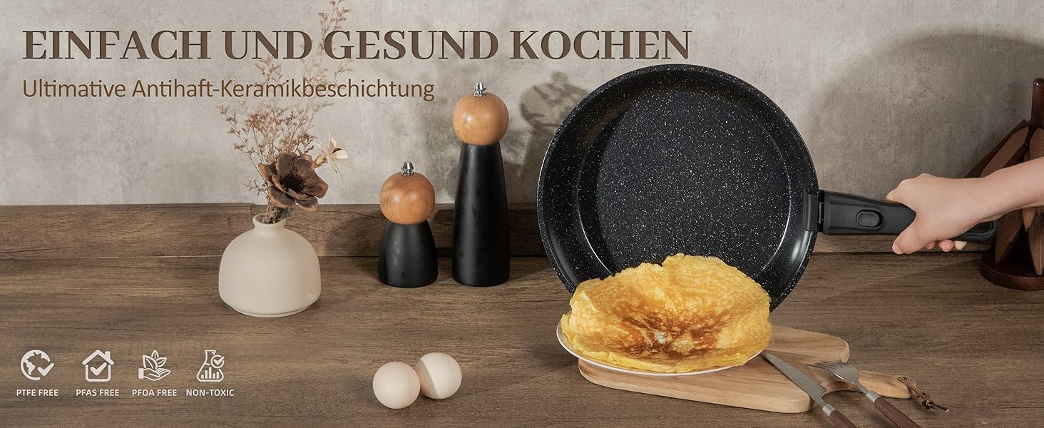 Набір посуду керамічний 23 предмети з антипригарним покриттям та знімними ручками, чорний. Підходить для всіх типів плит, включаючи індукційні. Сковороди 20/26 см, каструля 18 см, сотейник 24 см, жароміцний.