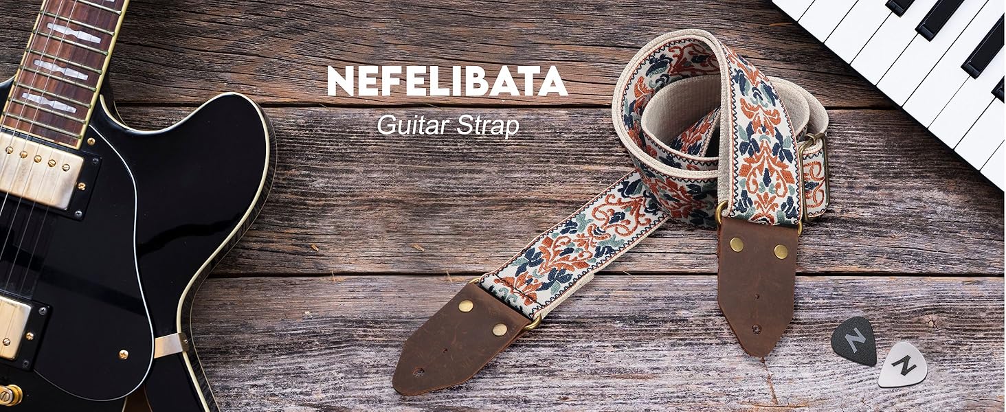 Гітарний ремінь Nefelibata з жаккардовим вишиванням, бавовна, з кінцями з Crazy Horse Leather. Підходить для електро- та акустичної гітари, бас-гітари. Подарунок для дітей та гітаристів. Елегантний синій квітковий дизайн.