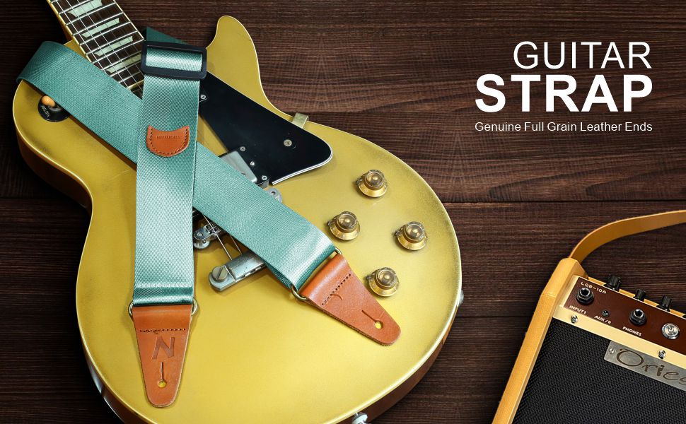 Гітарний ремінь з кишенею для медіатора, вінтажний, з кінцями з повном'якої шкіри. Підходить для бас-гітари, електро- та акустичної гітари. З безкоштовним кріпленням для ременя, 1 паром затискачів та 4 медіаторами. Колір: світло-зелений