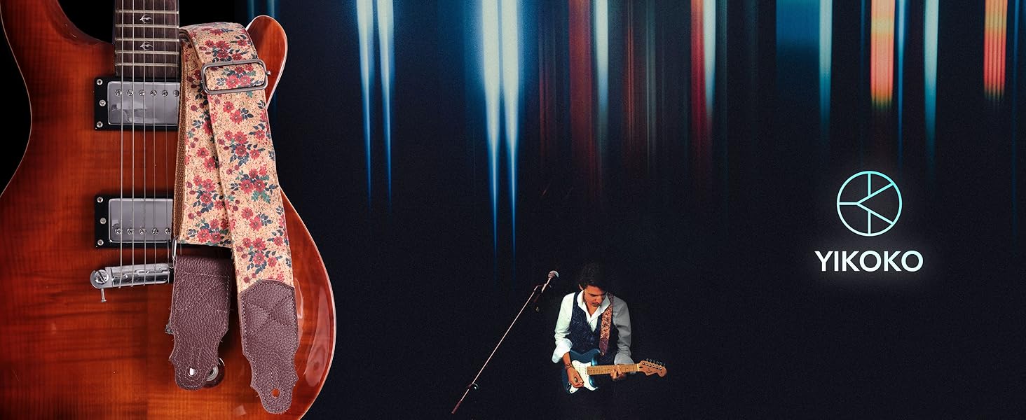 Гітарний ремінь з натуральної шкіри (2 дюйми) для акустичної, бас та електрогітари. Регулюється від 96 до 163 см. М'яка обробка деревини, коричнева квітка.