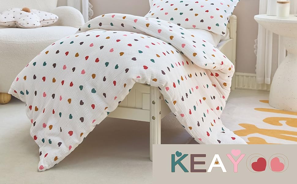 Муслінова постільна білизна для дитячого ліжечка: комплект для малюків та дітей (100x135cm + 40x60cm, сердечка)