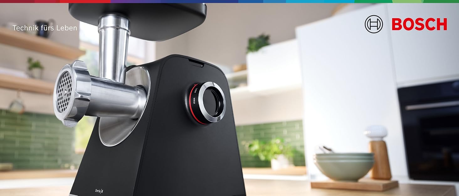 М'ясорубка Bosch MFW68660 срібляста (чорна) 2200 Вт, насадки для ковбас, 4 терки, 3 диски з нержавіючої сталі (3/4.8/8 мм)