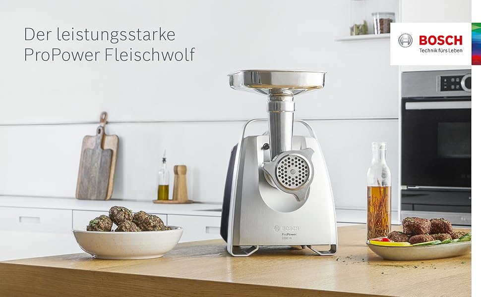 М'ясорубка Bosch MFW68660 сріблясто-чорна, 2200 Вт, насадки для ковбас, 4 тертки, 3 диски з нержавіючої сталі (3, 4.8, 8 мм)