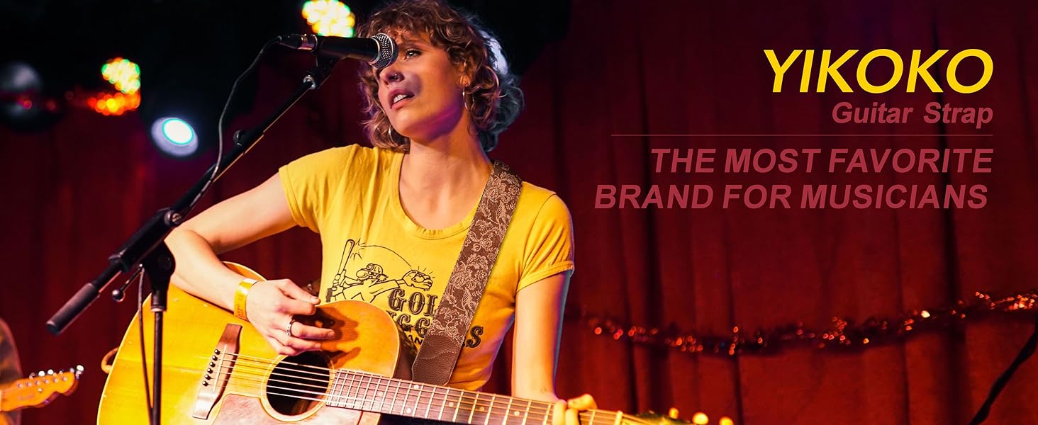 Гітарний ремінь з натуральної шкіри (2 дюйми) для акустичної, бас та електрогітари. Регулюється від 96 до 163 см. М'яка обробка деревини, коричнева квітка.