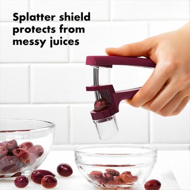 OXO Good Grips видаляч кісточок для вишень та оливок, зелений, кухонний інструмент