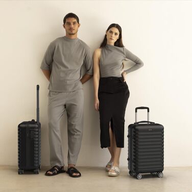 Ручна поклажа валіза Upfly XS 55x36x19 см, 31 л, ABS, 4 подвійні гумові колеса, кодовий замок, роздільник, ремені для фіксації, чорна жорстка оболонка