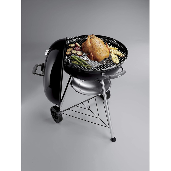 Вугільний гриль Weber Compact Kettle 57 см, порцелянове емалювання, кришка і котел, тринога з колесами, хромована решітка, чорний