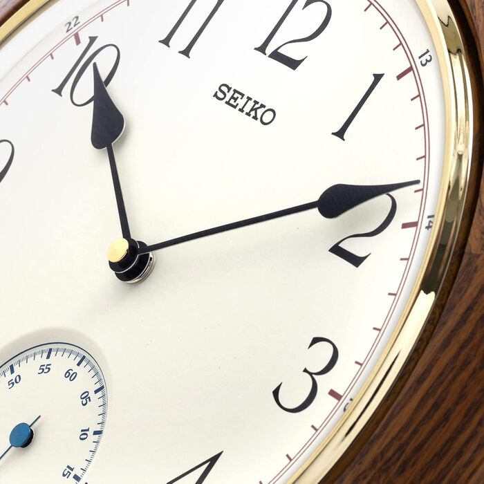 Настінний годинник Seiko коричневий, дерево (дуб), безшумний механізм QXA432B