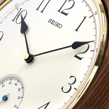 Настінний годинник Seiko коричневий, дерево (дуб), безшумний механізм QXA432B